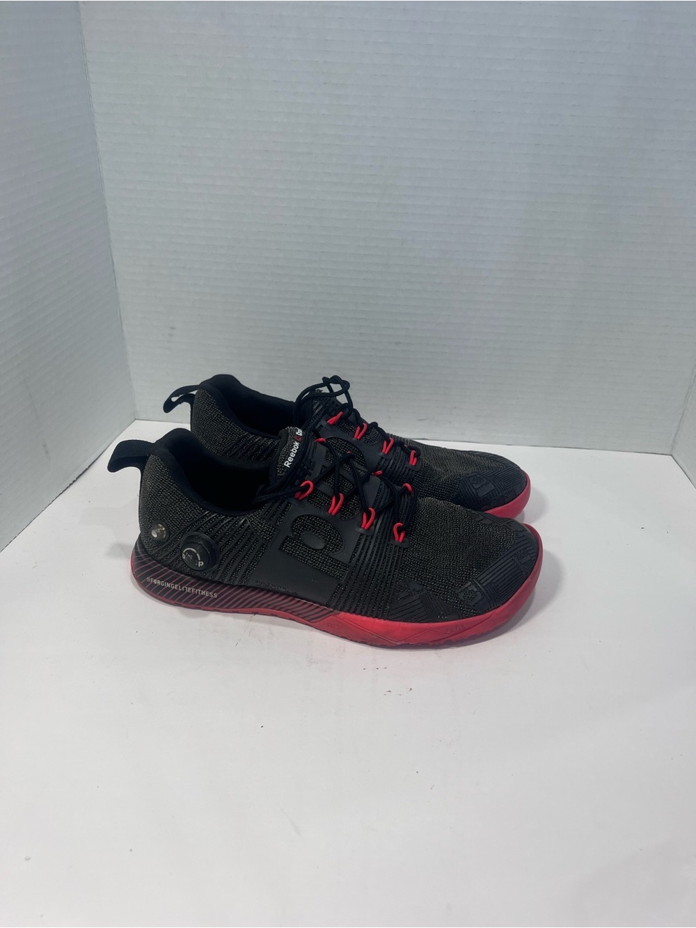 Reebok Women’s Black Knit Sneakers with Red Accents